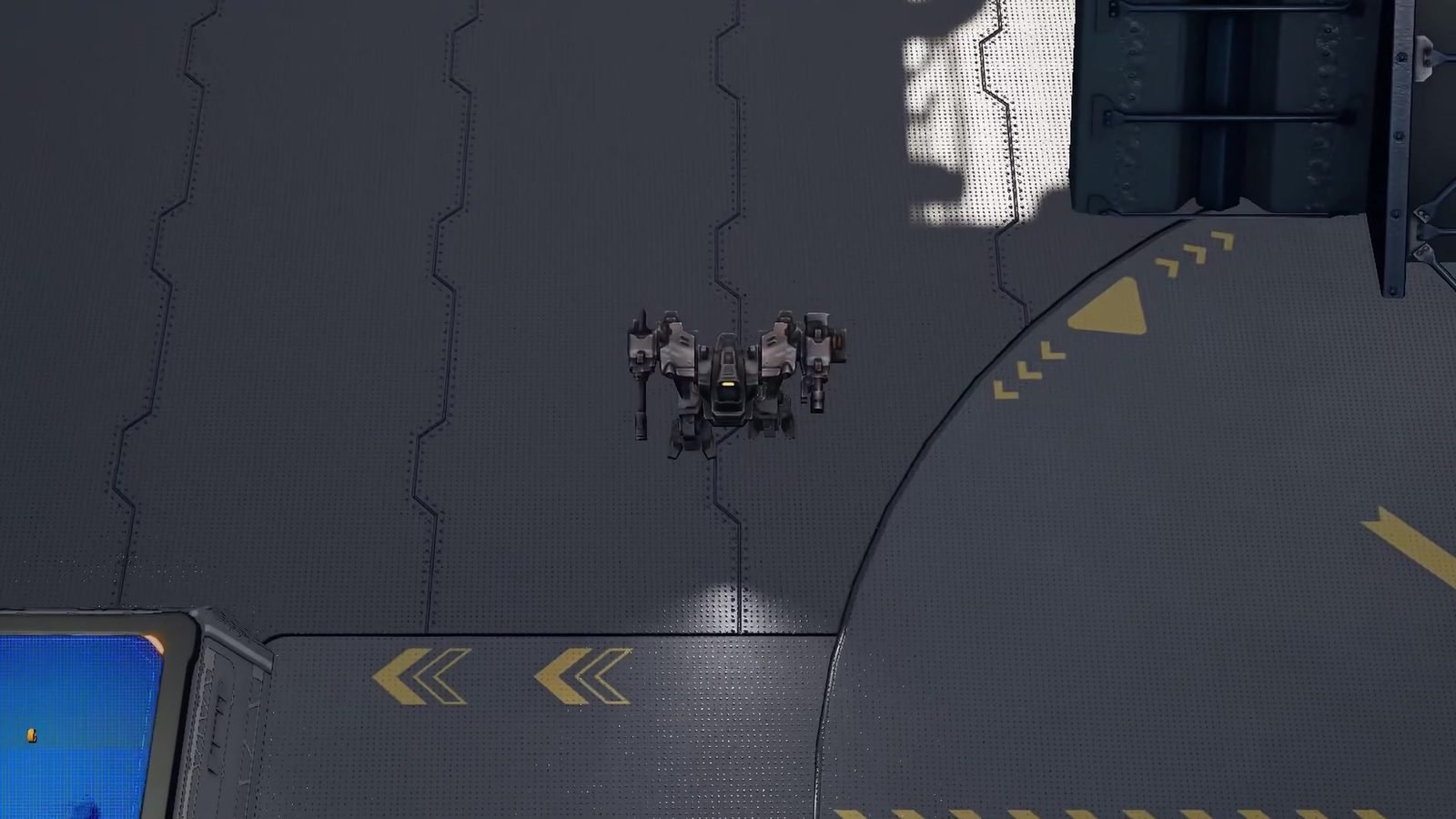 A mech walking out of the hangar